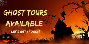 Spooky black house with orange background with "Ghost tours available" in large yellow letters with "Let's Get Spooky" in smallers yellow letters